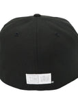 Black cap with a brand label on a white background