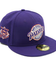 A purple fitted hat with metallic patches featuring the San Diego Padres logo.
