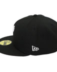 Black cap with New Era logo on a white background