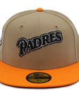 A fitted hat with the San Diego Padres logo, featuring a two-tone kakhi and orange design with a red under visor.
