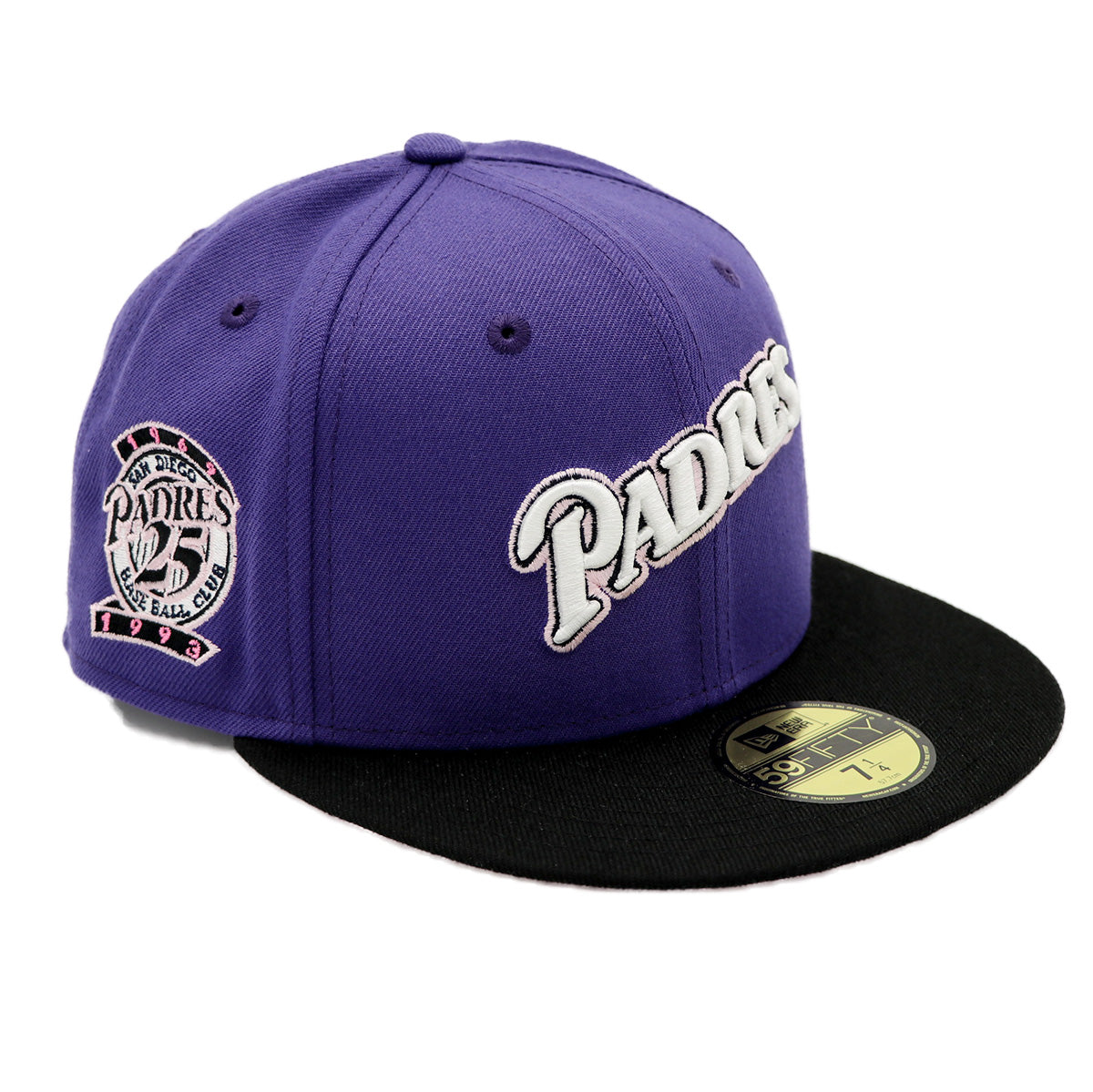 A 2-tone purple and black fitted hat with the San Diego Padres script logo, a 25th Anniversary side patch, and a pink under visor.