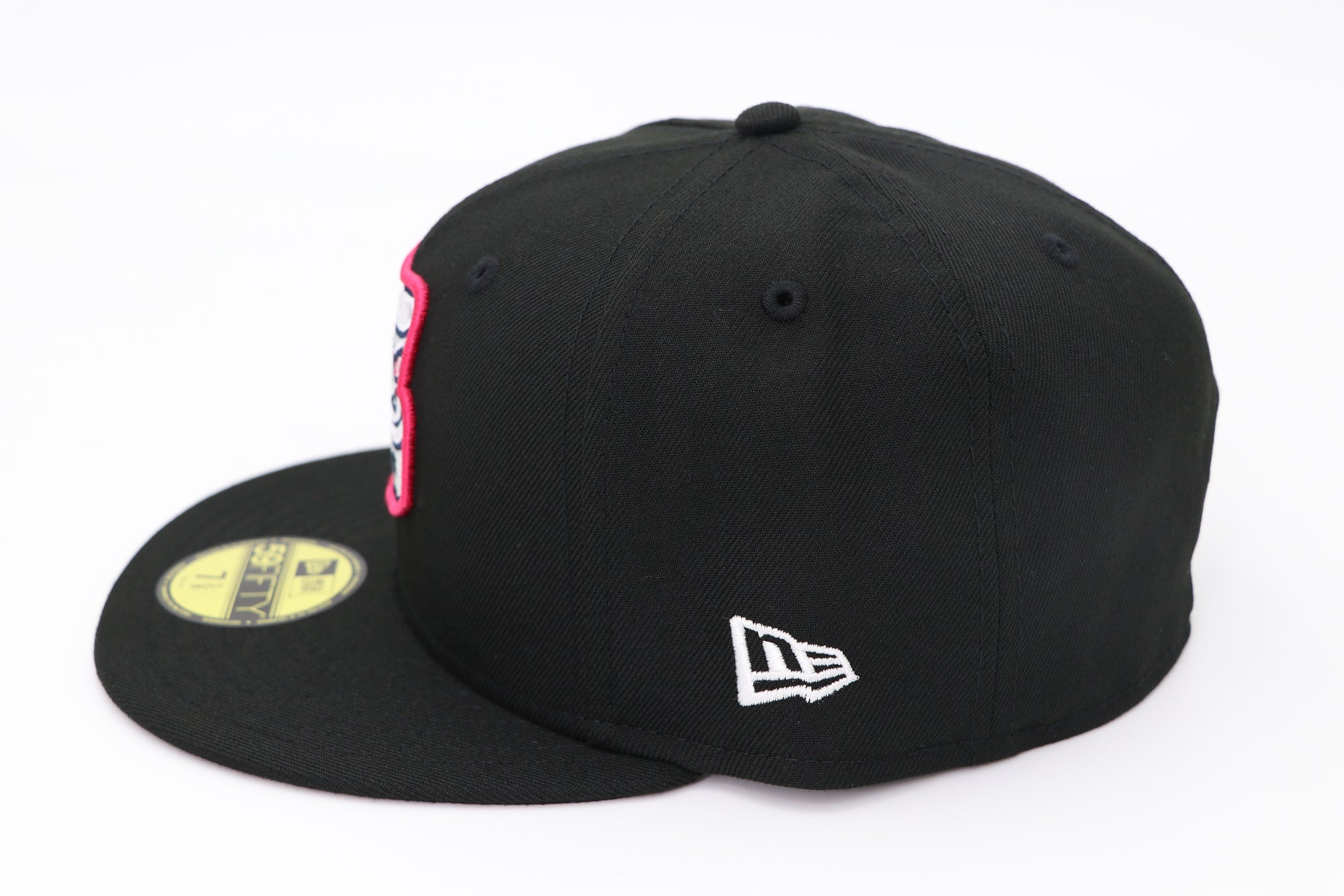 Black baseball cap with New Era logo on a white background