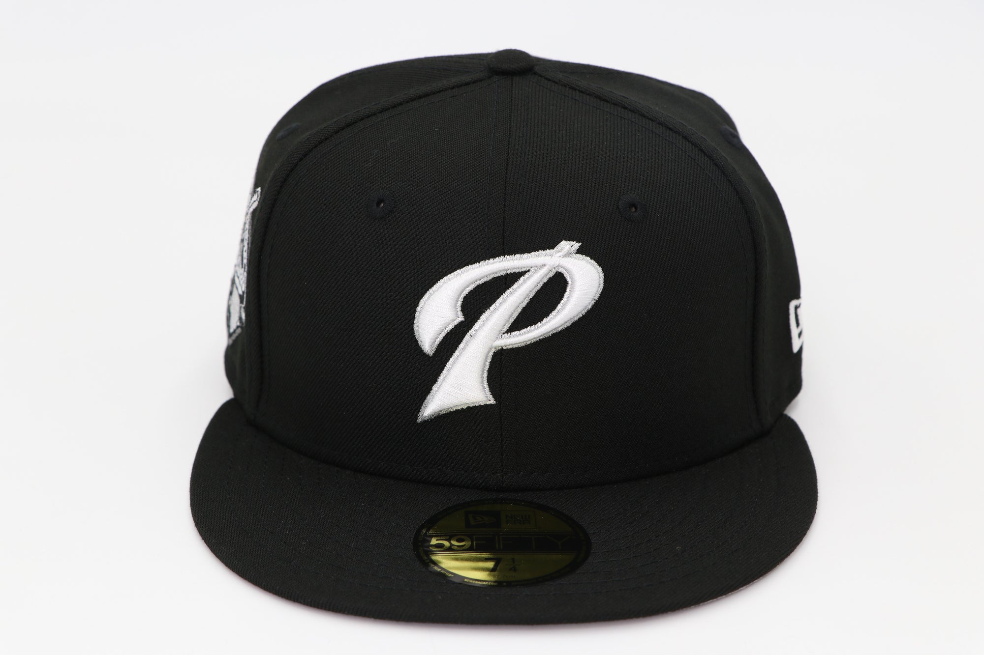 Black baseball cap with a white logo on a white background
