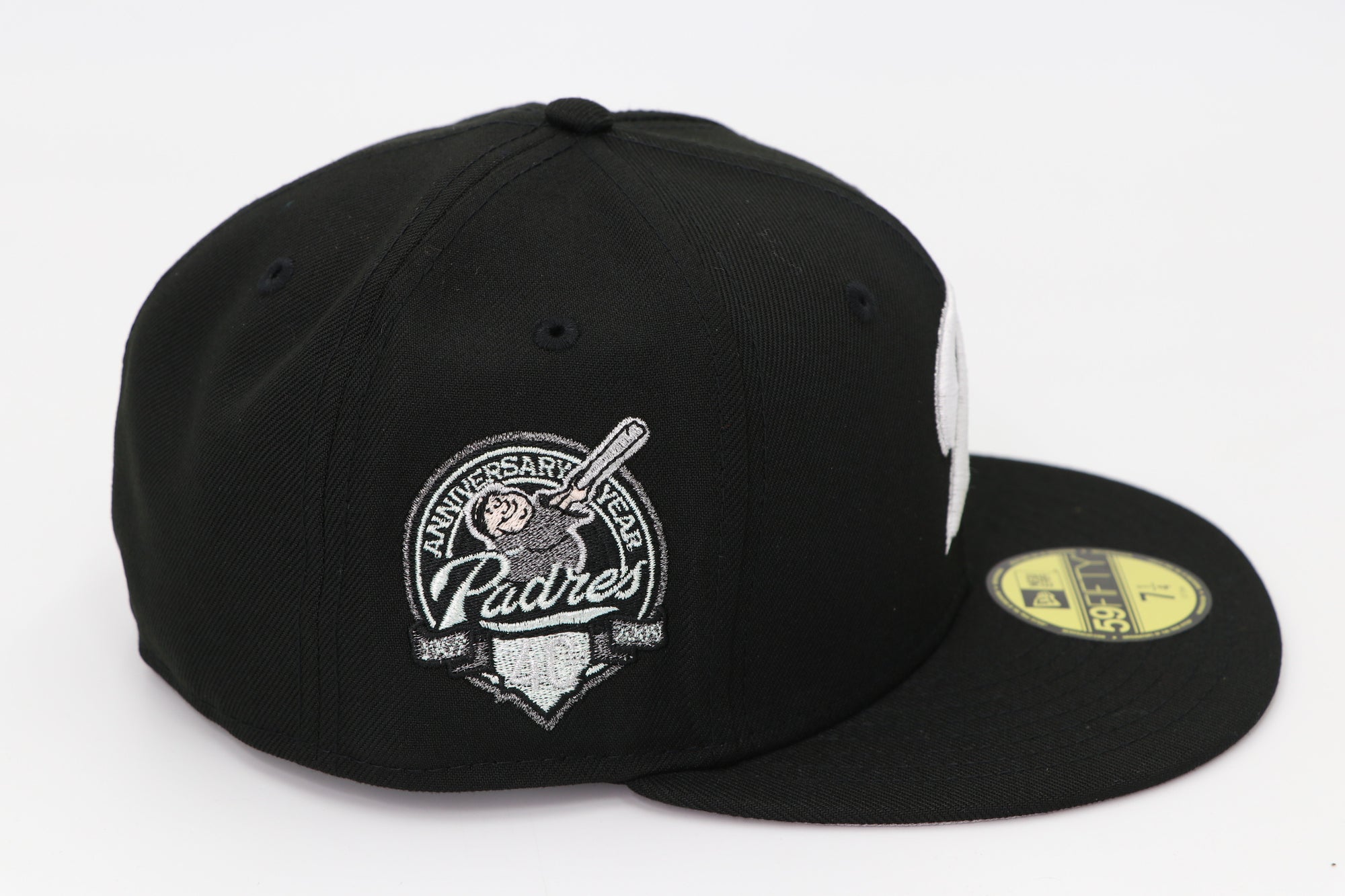 Black cap with a logo on a white background