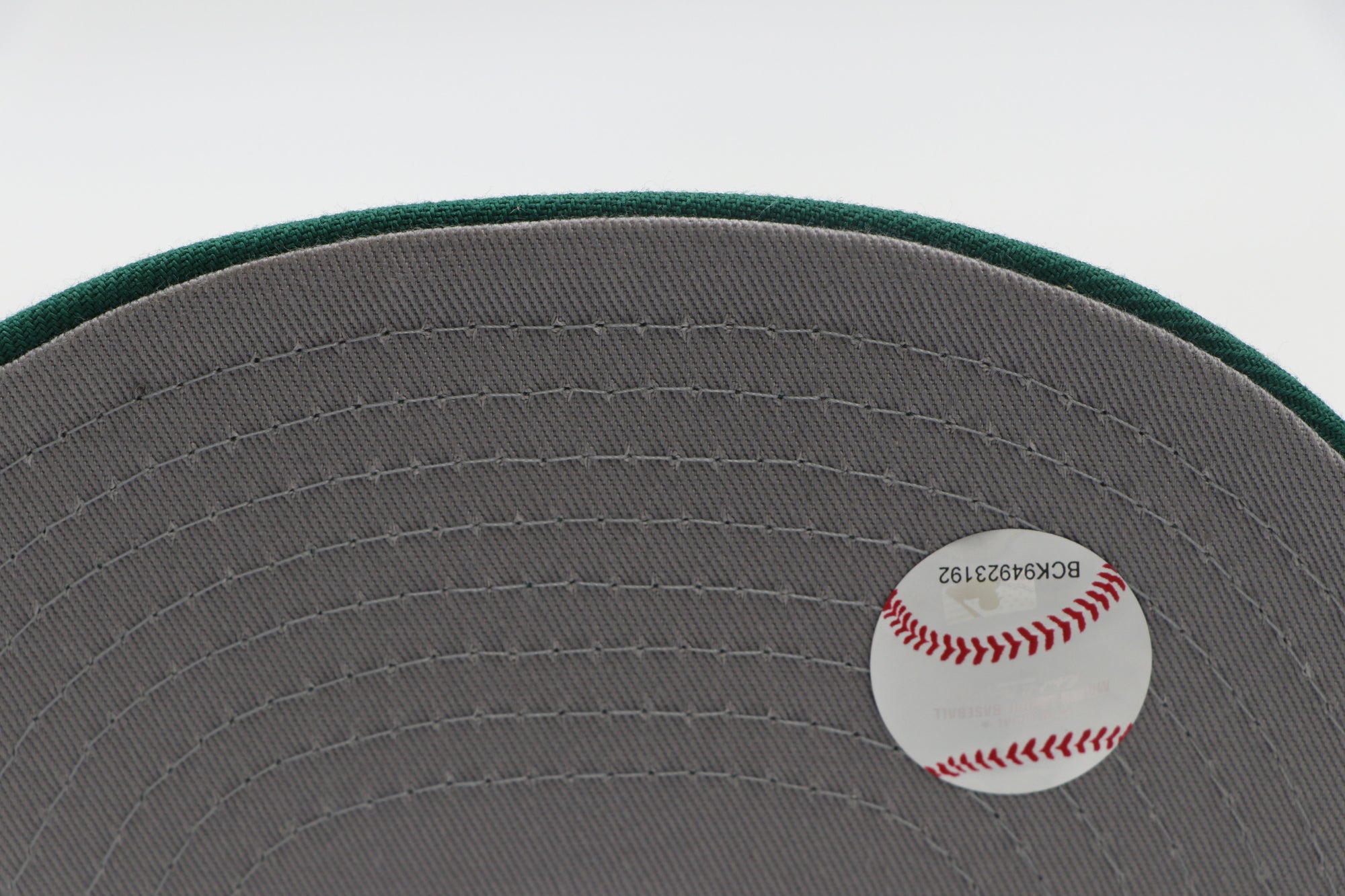 Brim with a baseball logo and text on a white background